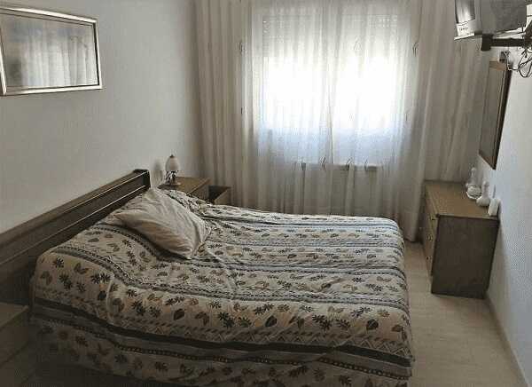 купити квартиру 2 спальні Іспанія Льорет де Мар спальня
